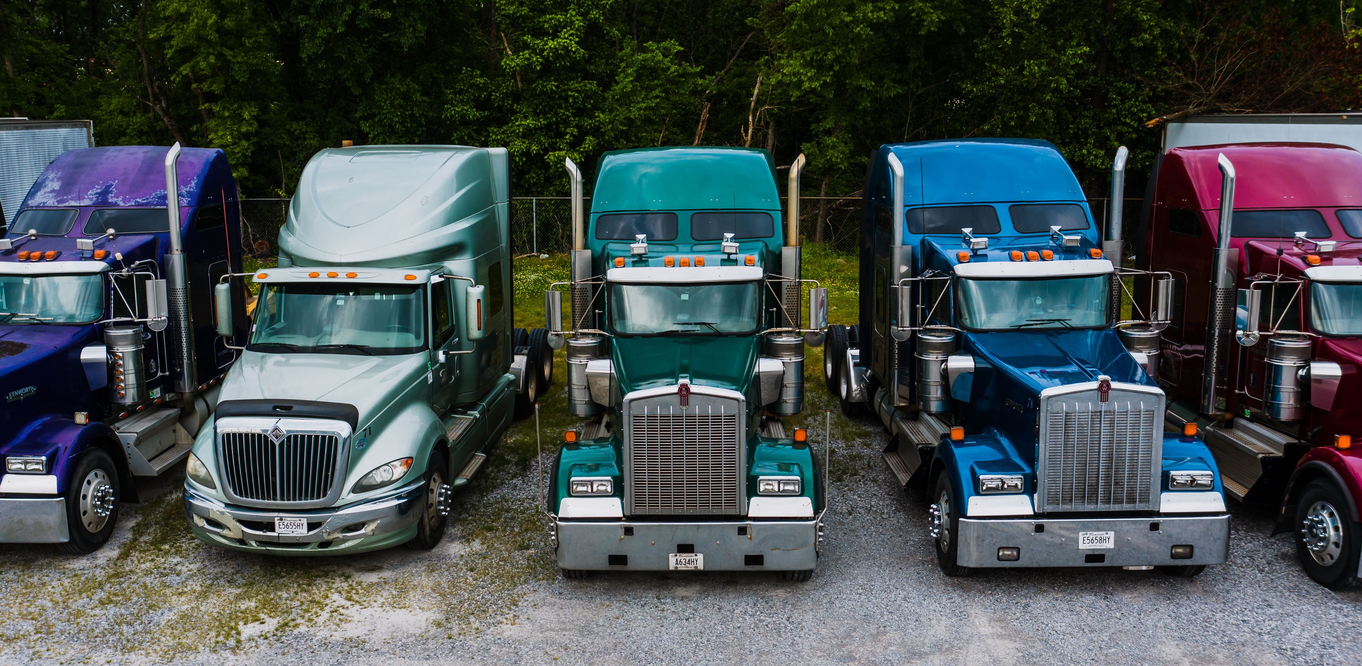Tractor trailers parked in a carrier yard
